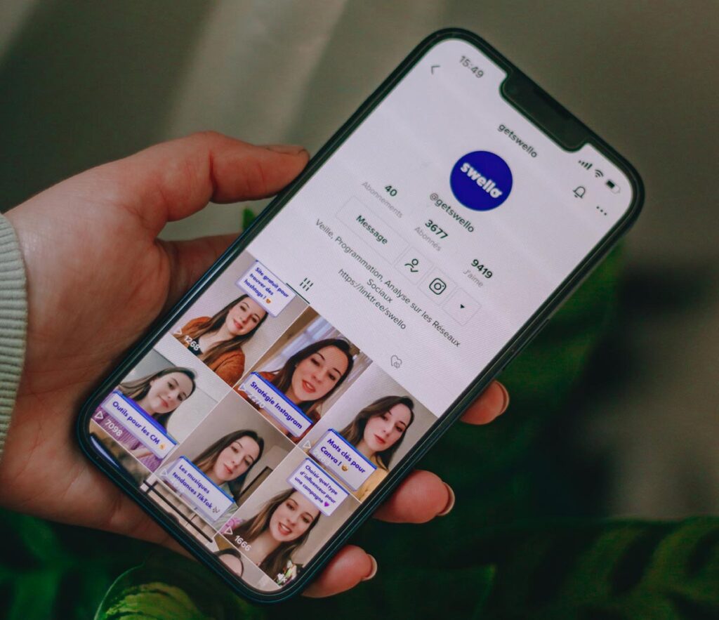 User browsing dating app video profiles on smartphone with AI verification features to prevent catfishing