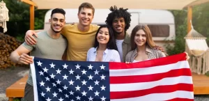 Romantic couple on the beach at sunset holding a red rose, symbolizing love and connection for the best dating sites for long distance relationships.